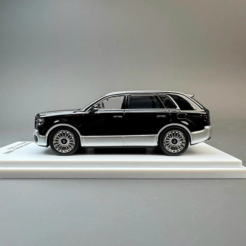 Remote-controlled diecast model of a black and silver luxury SUV