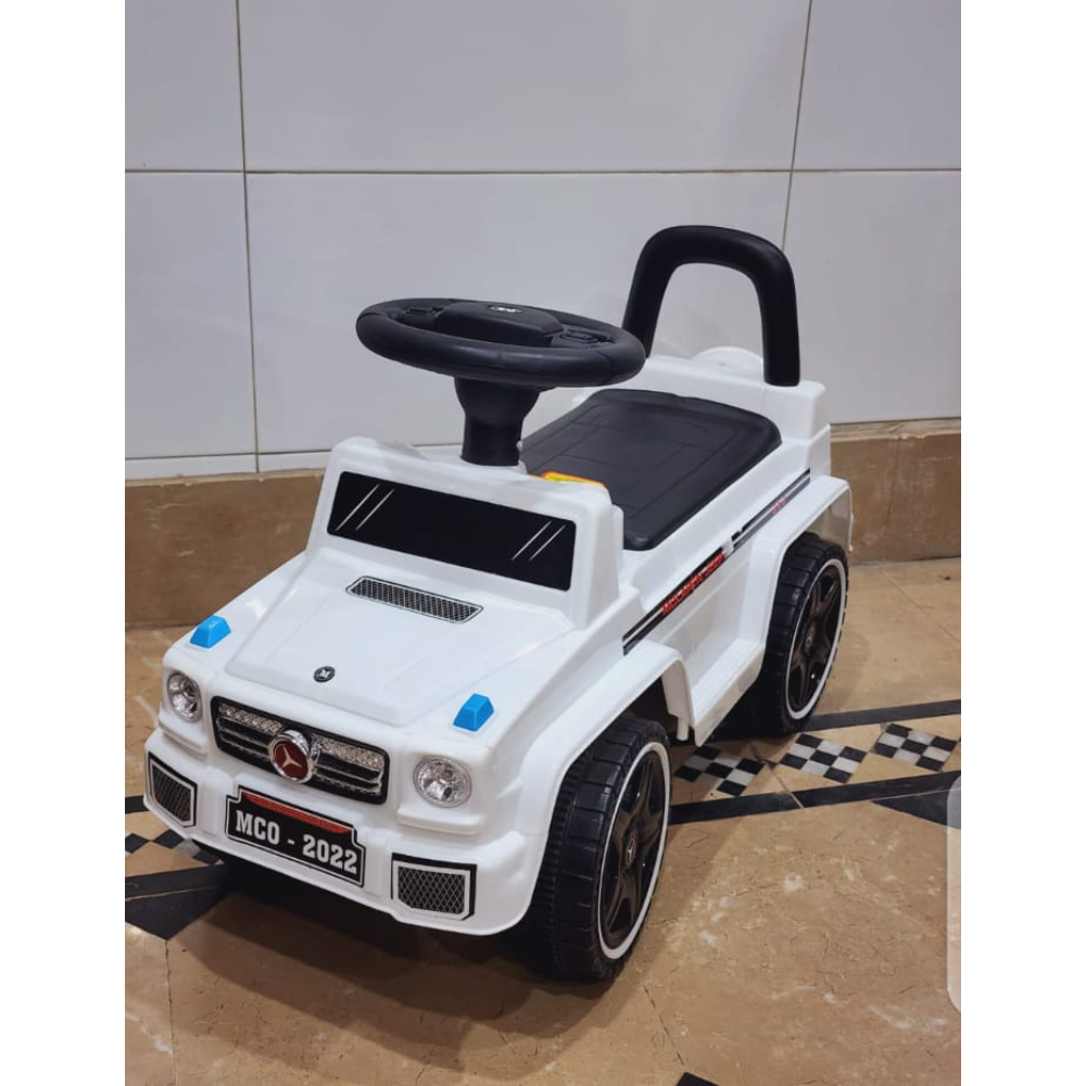 white Mercedes-Benz G-Class style foot-to-floor push ride-on car for toddlers