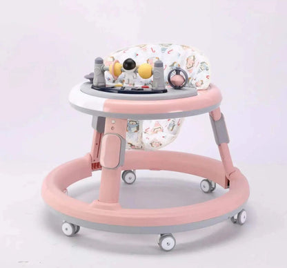 Pink and grey multi-functional baby walker with a rounded base