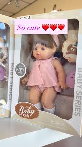 Soft Simulation Doll Series baby doll wearing a pink dress